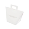 أكياس ورق كرافت بيضاء مخصصة بشعار مخصص 9.5 * 9 * 12 سم حقيبة هدايا فرنسية بشريط
